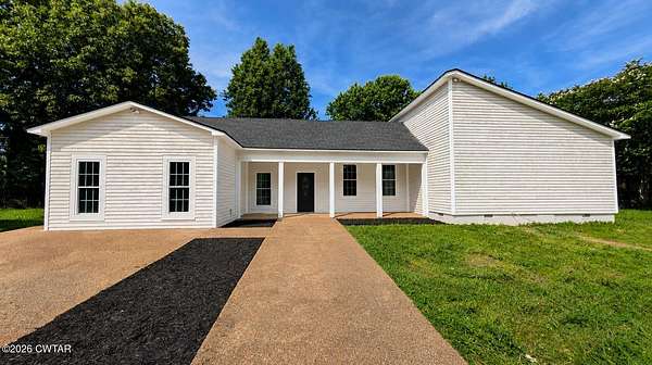 1.5 Acres of Land with Home for Sale in Lexington, Tennessee