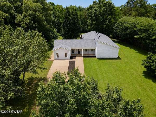 1.5 Acres of Land with Home for Sale in Lexington, Tennessee