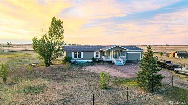 2.5 Acres of Land with Home for Sale in Strasburg, Colorado