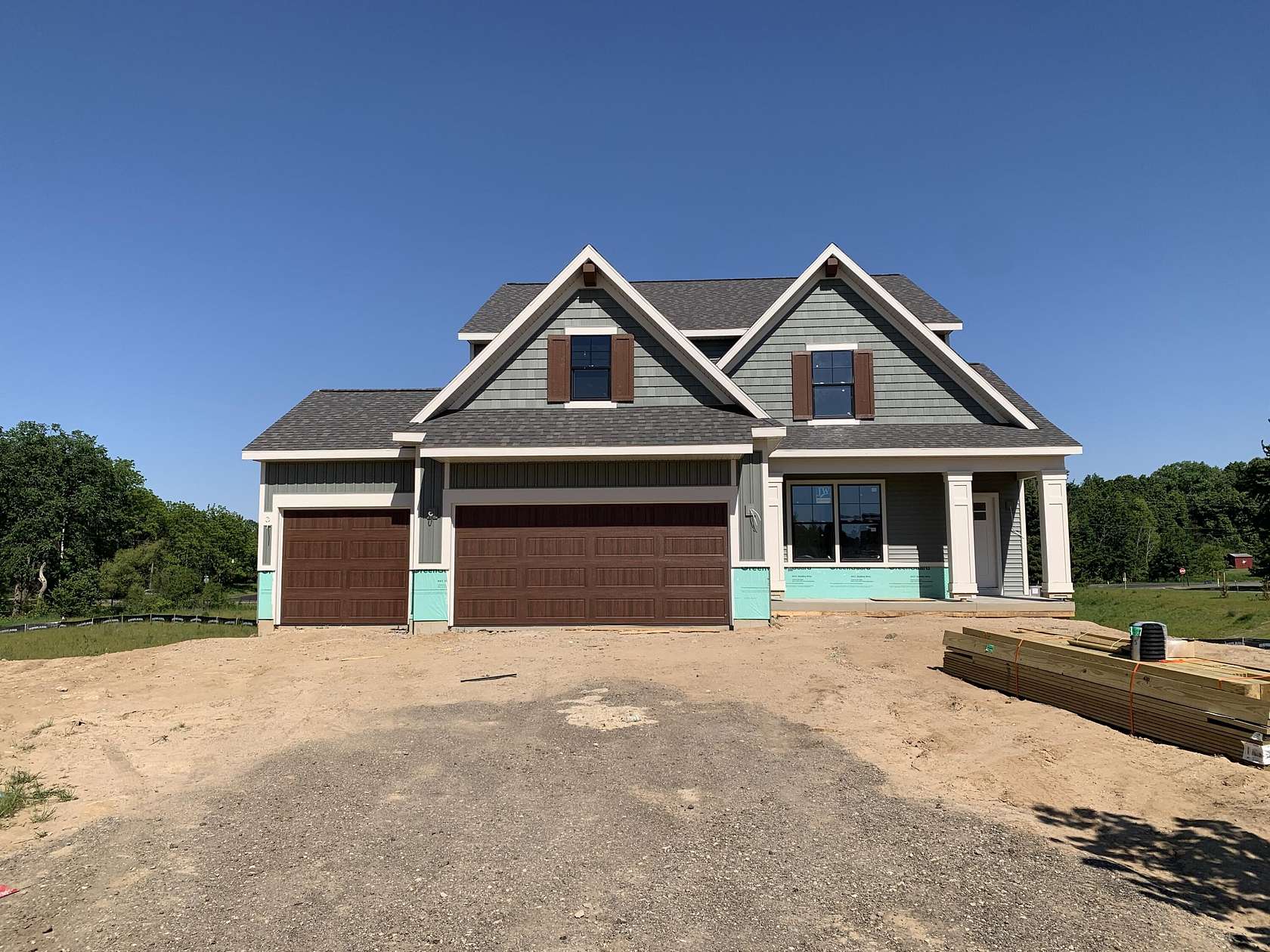 1.5 Acres of Land with Home for Sale in Rockford, Michigan