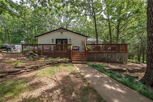 5.47 Acres of Land with Home for Sale in West Fork, Arkansas