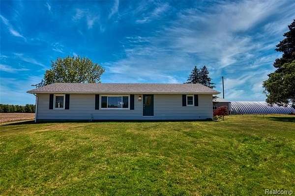 5 Acres of Land with Home for Sale in Goodland Township, Michigan