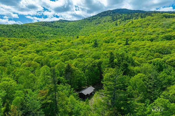 23.3 Acres of Recreational Land with Home for Sale in Keene, New York