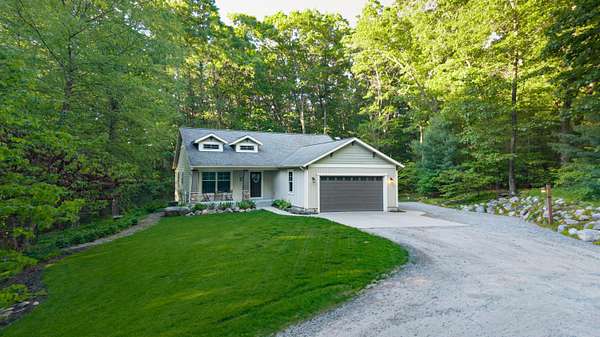 2.27 Acres of Land with Home for Sale in Twin Lake, Michigan