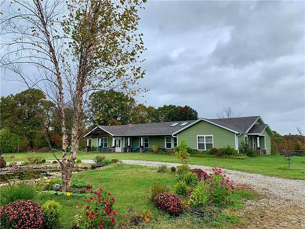 15 Acres of Land with Home for Sale in Bentonville, Arkansas