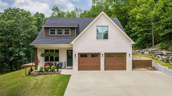 6.14 Acres of Land with Home for Sale in Greenbrier, Arkansas