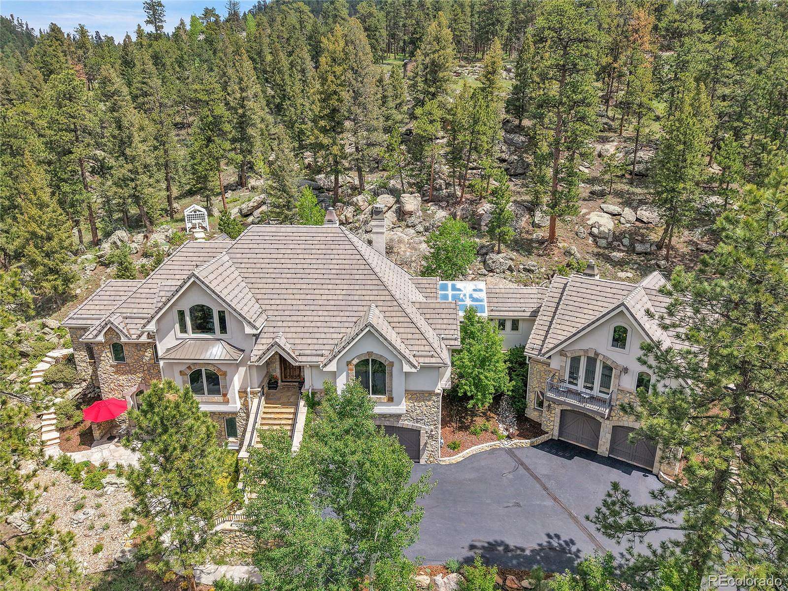 4.86 Acres of Land with Home for Sale in Evergreen, Colorado