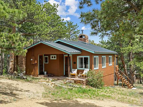 3.84 Acres of Land with Home for Sale in Allenspark, Colorado