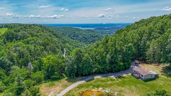 7.5 Acres of Land with Home for Sale in Spring City, Tennessee
