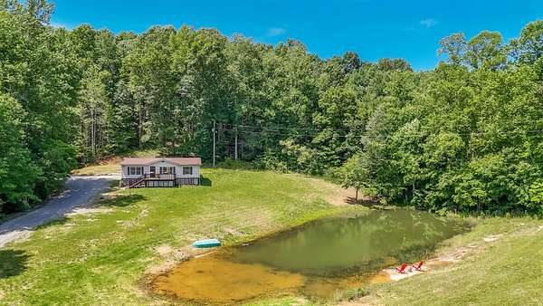 7.5 Acres of Land with Home for Sale in Spring City, Tennessee