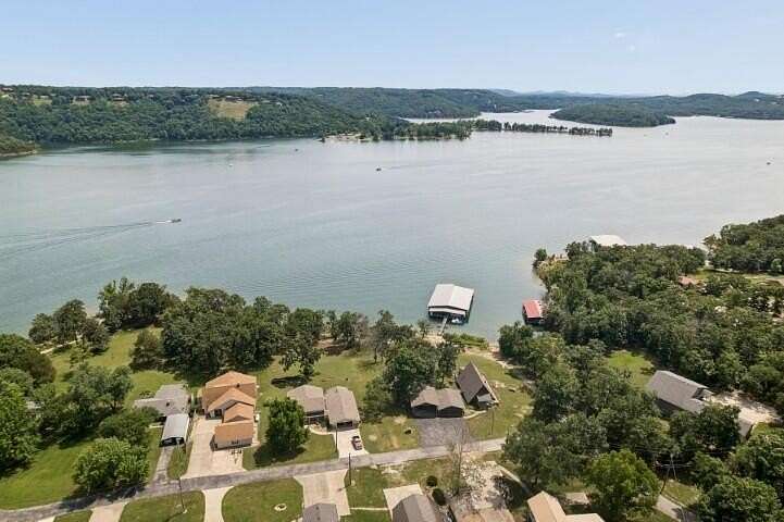 57 Acres of Land with Home for Sale in Kimberling City, Missouri