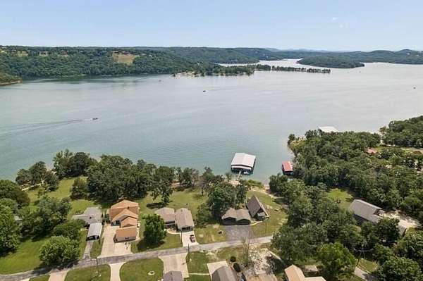 57 Acres of Land with Home for Sale in Kimberling City, Missouri