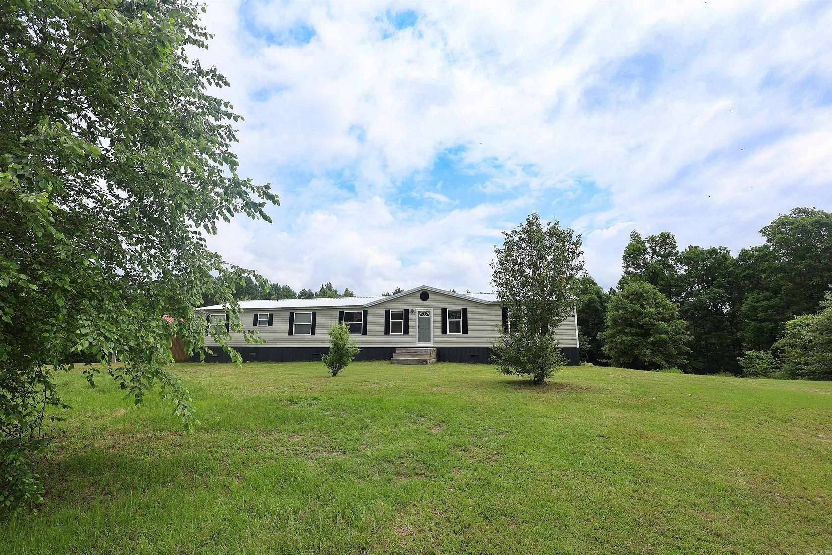 10.7 Acres of Recreational Land with Home for Sale in Amity, Arkansas