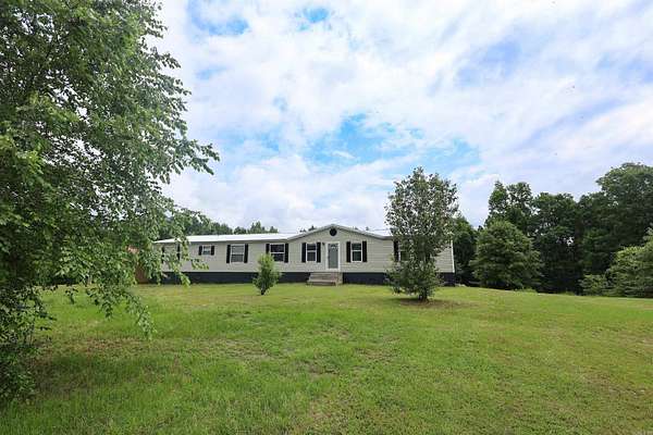 10.7 Acres of Recreational Land with Home for Sale in Amity, Arkansas