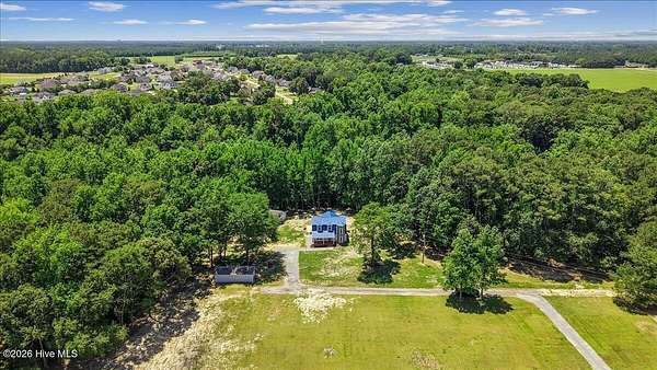 7 Acres of Land with Home for Sale in Pikeville, North Carolina