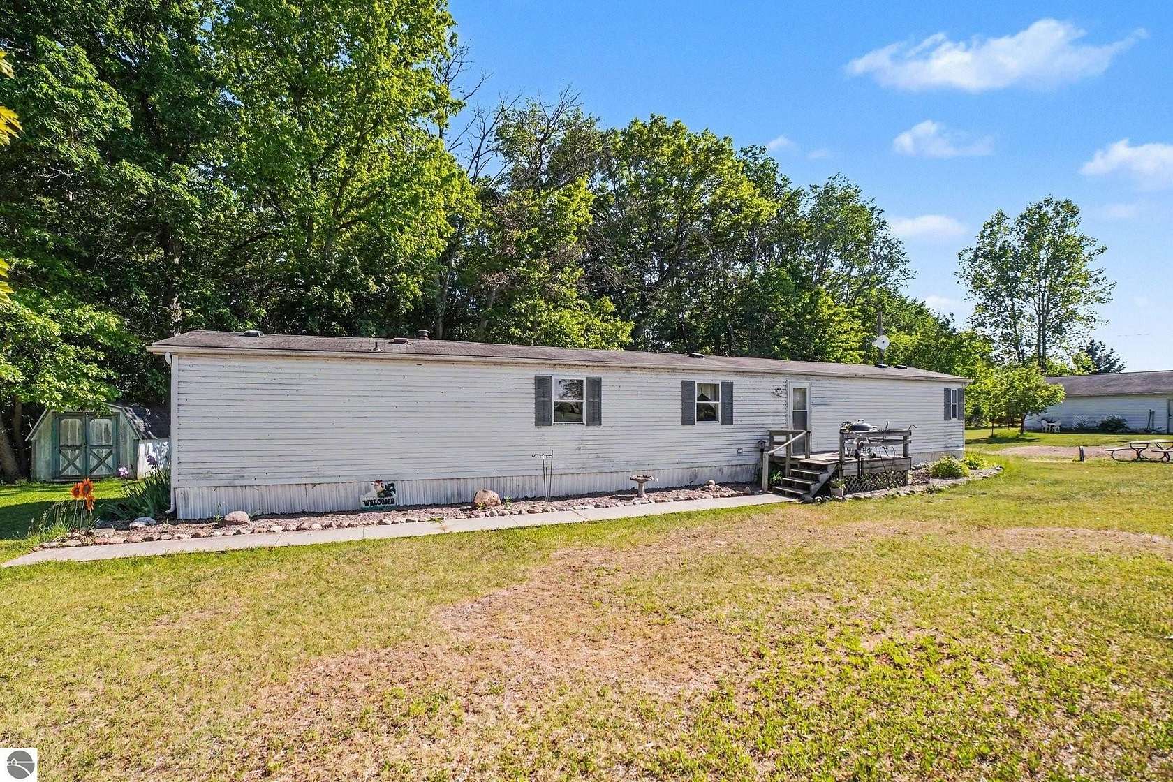 8 Acres of Land with Home for Sale in Shepherd, Michigan