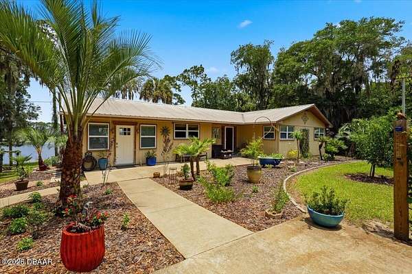 4.79 Acres of Land with Home for Sale in Pomona Park, Florida