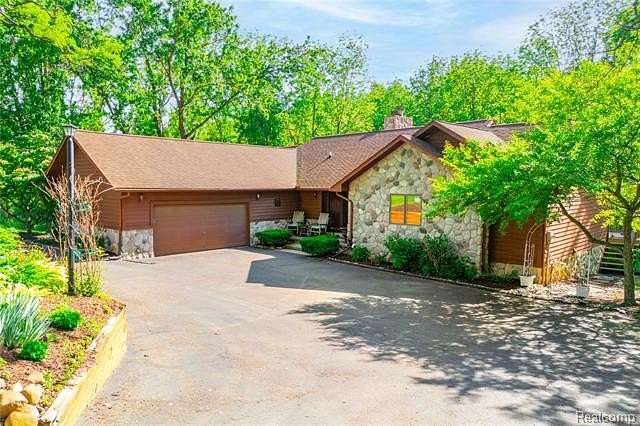 2.35 Acres of Land with Home for Sale in Commerce Township, Michigan