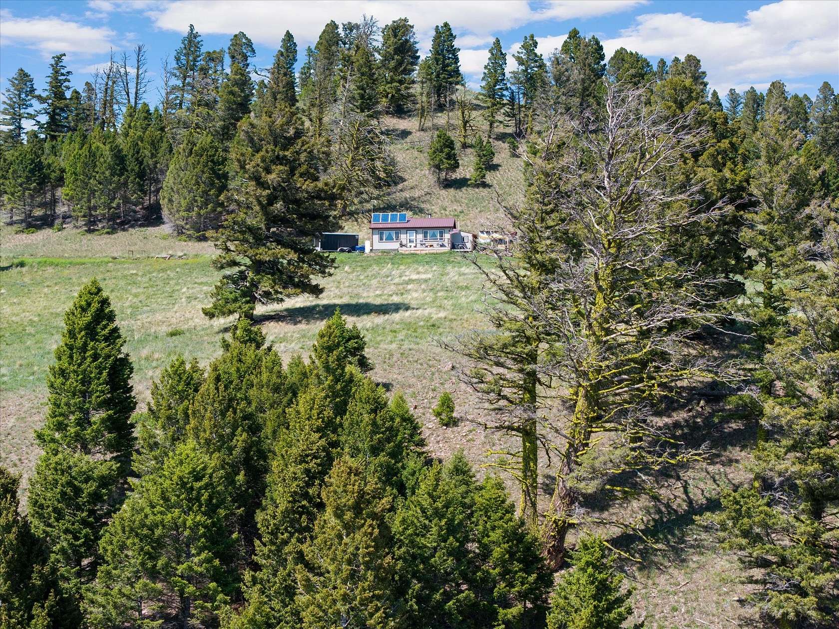 40 Acres of Recreational Land with Home for Sale in Helmville, Montana