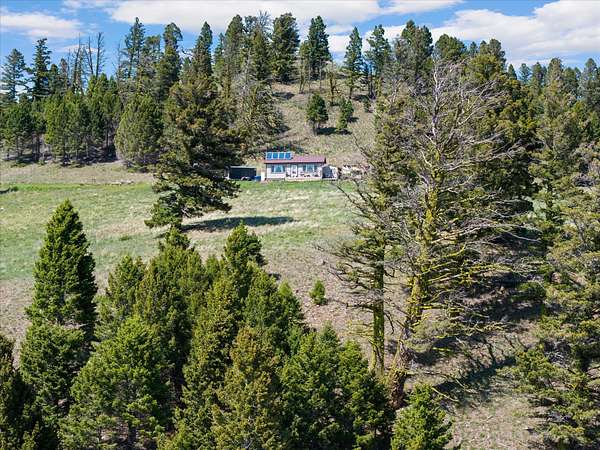 40 Acres of Recreational Land with Home for Sale in Helmville, Montana