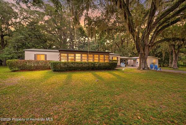 1.85 Acres of Land with Home for Sale in Lake Panasoffkee, Florida