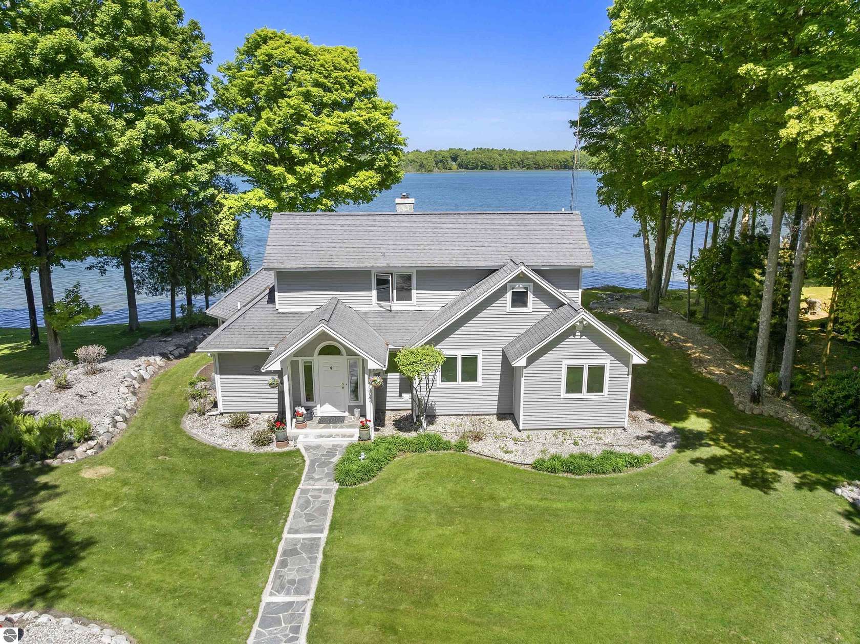 2.75 Acres of Land with Home for Sale in Honor, Michigan