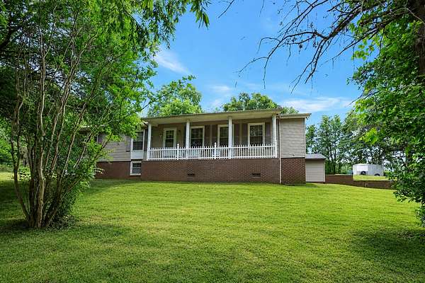 7.28 Acres of Land with Home for Sale in Cottontown, Tennessee