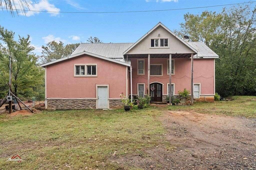 4.32 Acres of Land with Home for Sale in Waskom, Texas