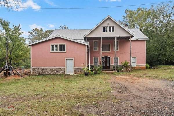 4.32 Acres of Land with Home for Sale in Waskom, Texas