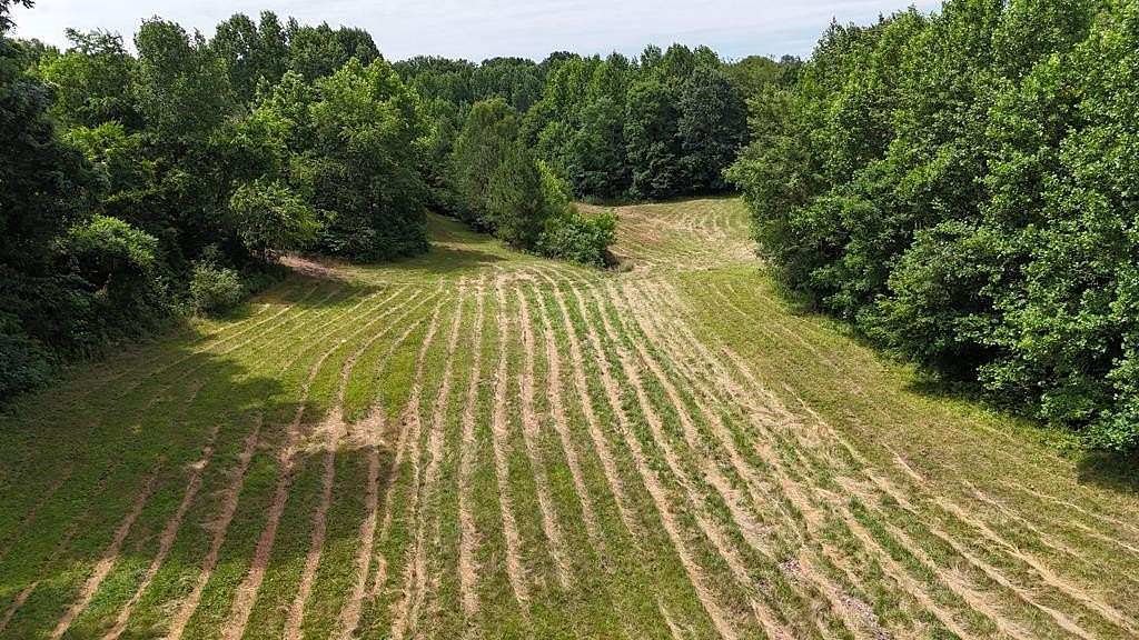21 Acres of Recreational & Residential Land for Sale in Big Sandy, Tennessee