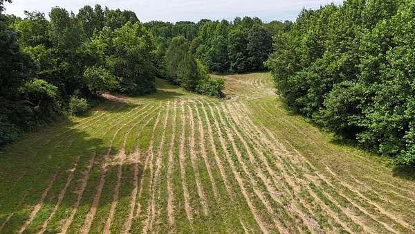 21 Acres of Recreational & Residential Land for Sale in Big Sandy, Tennessee