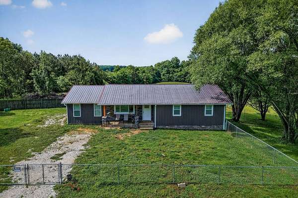 5 Acres of Land with Home for Auction in Walling, Tennessee