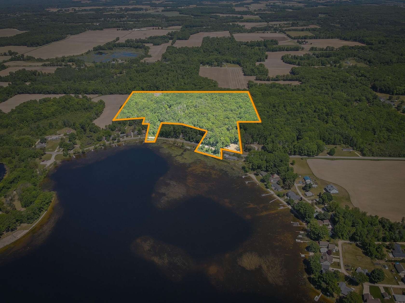 30 Acres of Recreational Land with Home for Sale in Howard City, Michigan