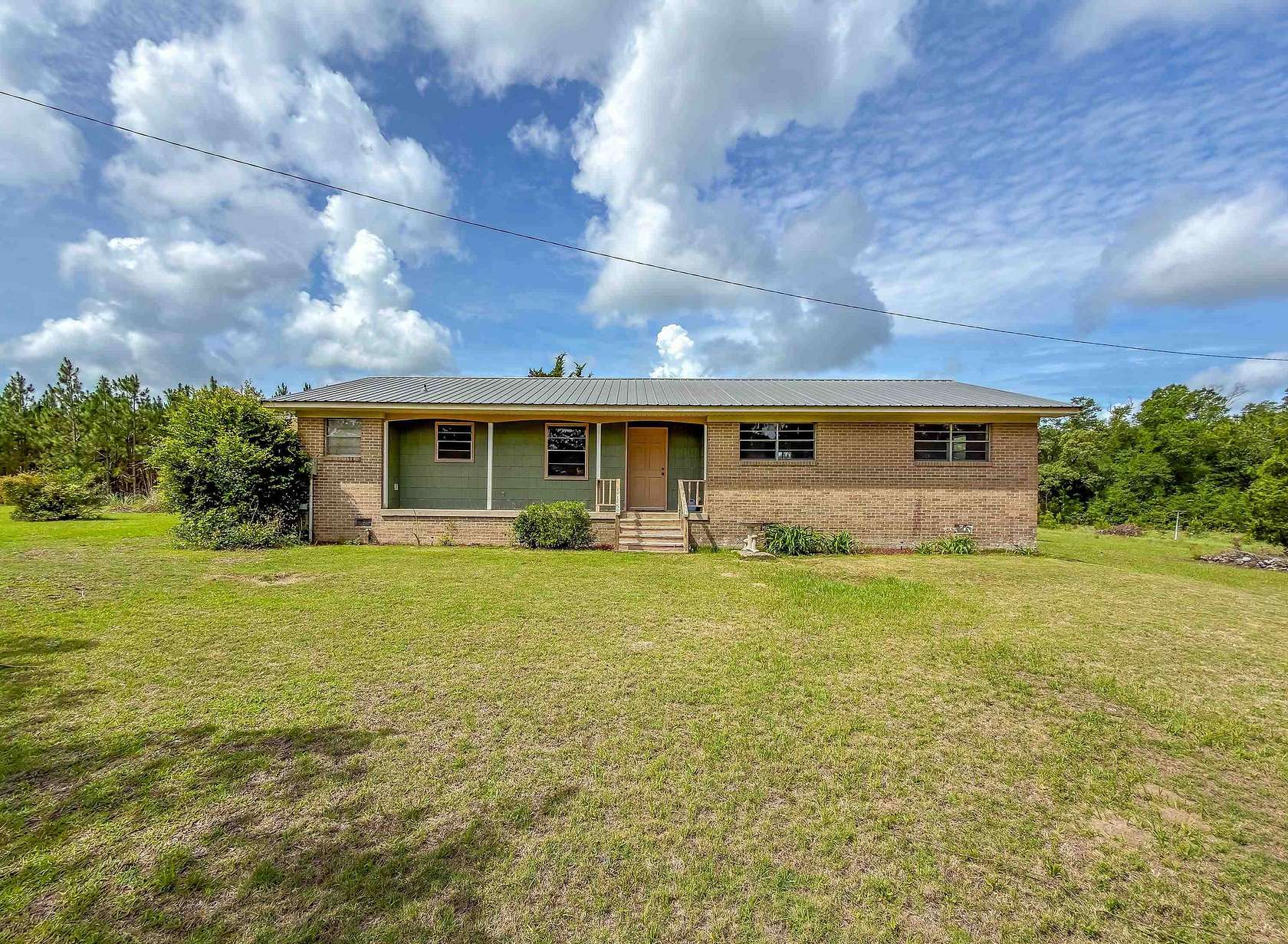 15.5 Acres of Land with Home for Sale in Marianna, Florida