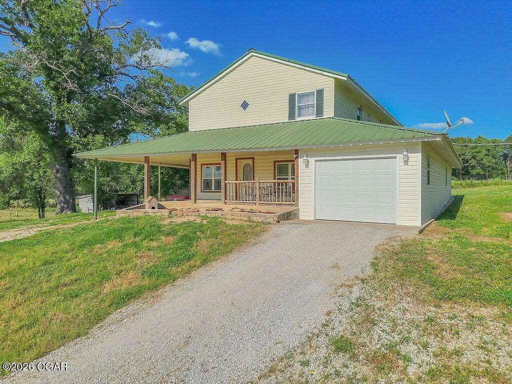 18.7 Acres of Land with Home for Sale in Wyandotte, Oklahoma