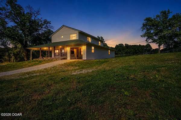 18.7 Acres of Land with Home for Sale in Wyandotte, Oklahoma