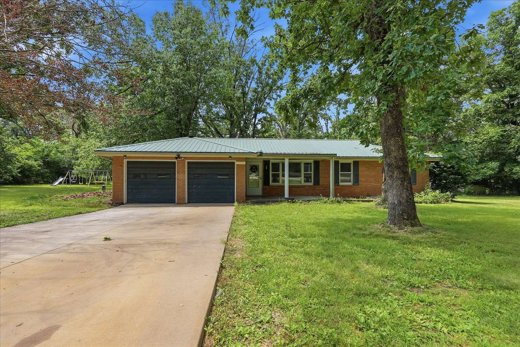 1.69 Acres of Land with Home for Sale in Rogersville, Missouri