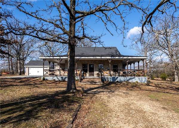 10 Acres of Land with Home for Sale in Watts, Oklahoma
