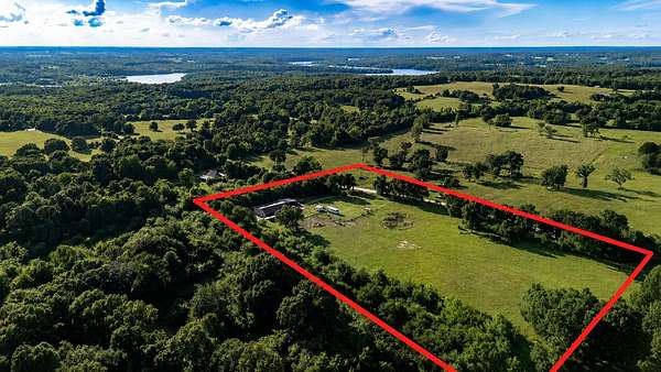 7.3 Acres of Land with Home for Sale in Everton, Missouri
