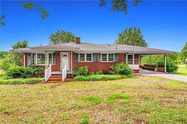 12.7 Acres of Land with Home for Sale in Seneca, South Carolina