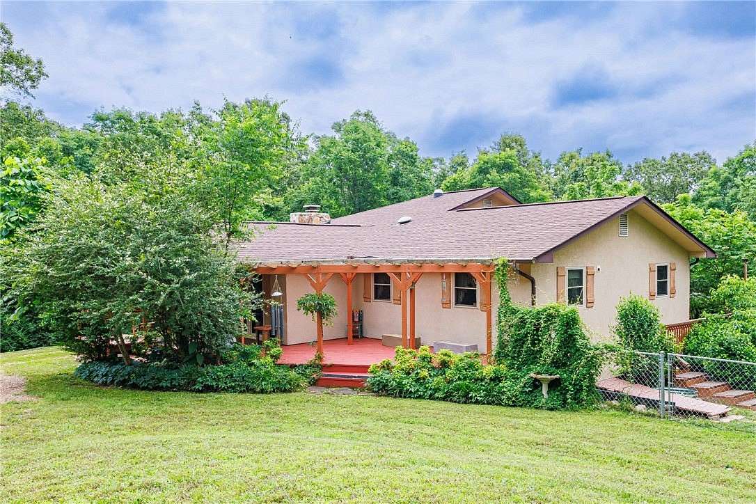 2.48 Acres of Land with Home for Sale in Flippin, Arkansas