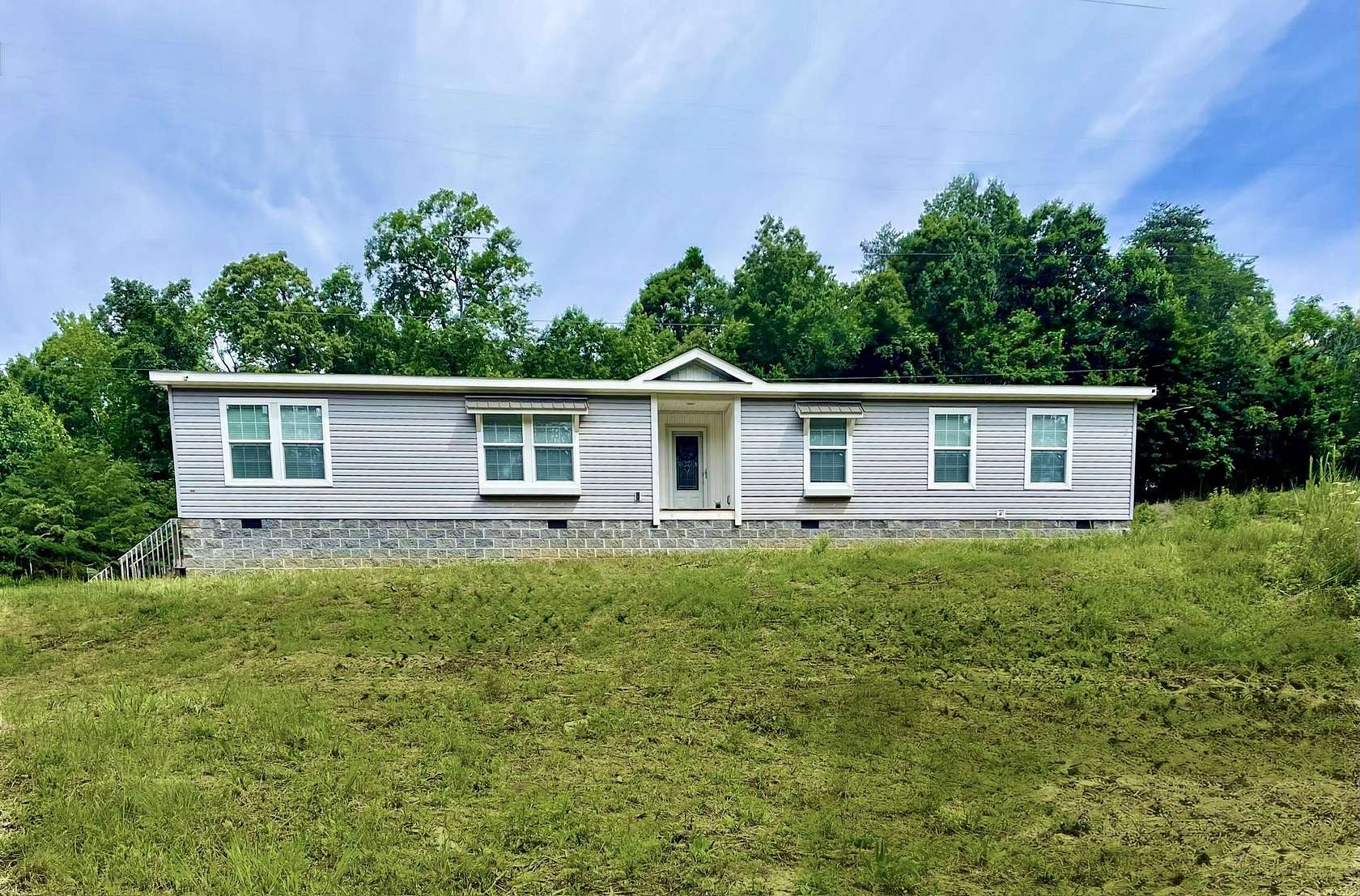 8.1 Acres of Land with Home for Sale in Dunlap, Tennessee