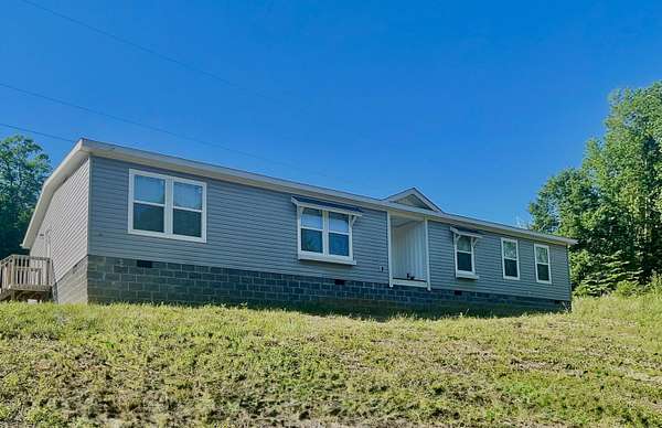 8.1 Acres of Land with Home for Sale in Dunlap, Tennessee
