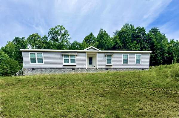 8.1 Acres of Land with Home for Sale in Dunlap, Tennessee