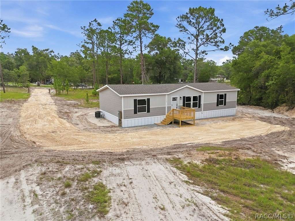 1.77 Acres of Land with Home for Sale in Dunnellon, Florida