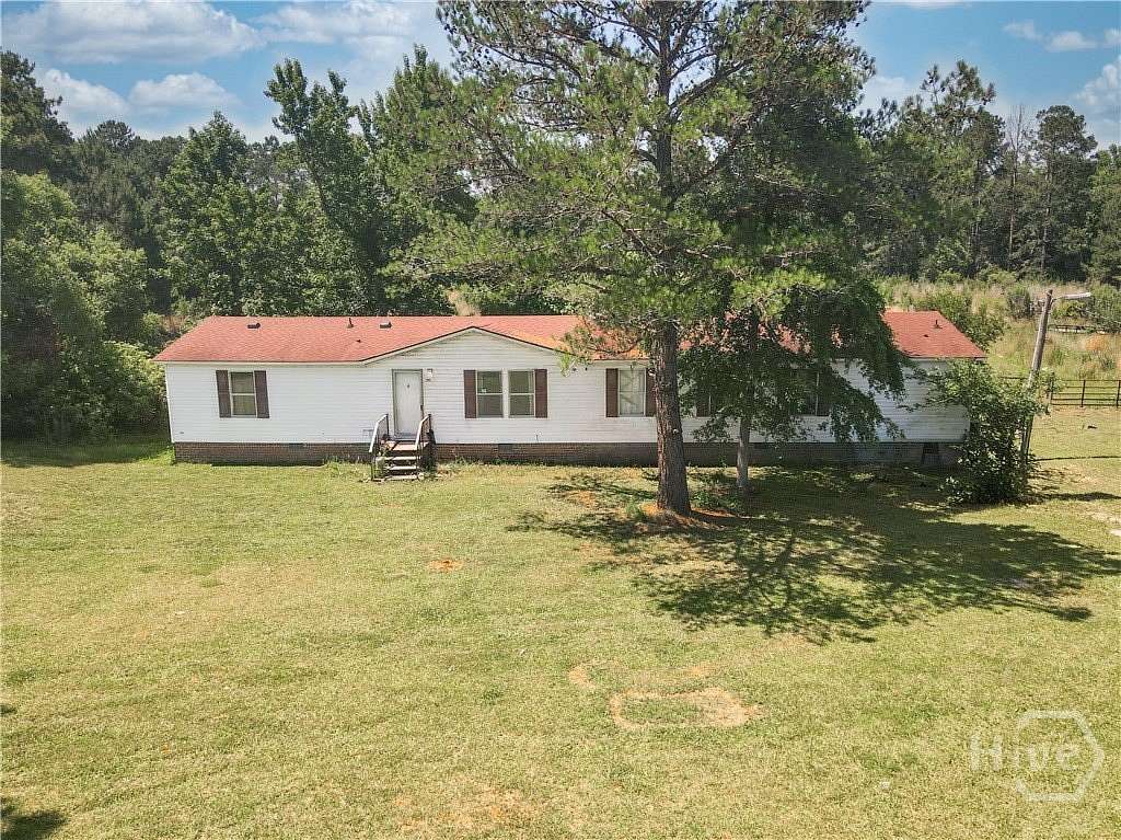 6.72 Acres of Land with Home for Sale in Guyton, Georgia