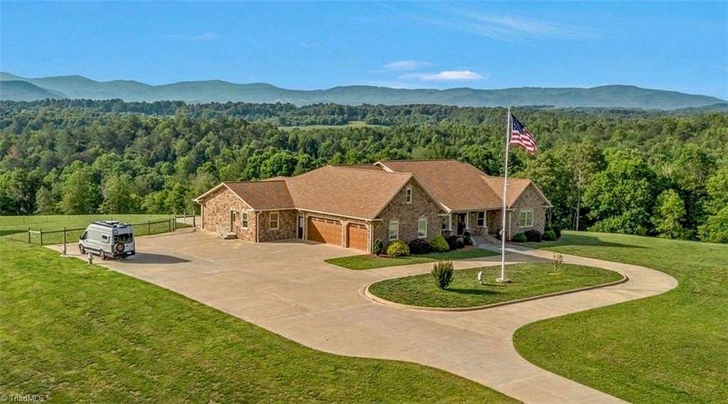 49.4 Acres of Land with Home for Sale in Roaring River, North Carolina