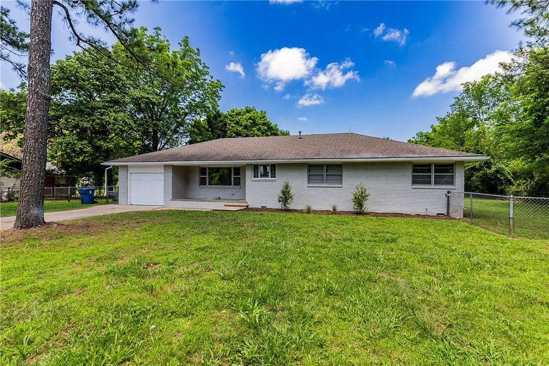 1.85 Acres of Land with Home for Sale in Gentry, Arkansas
