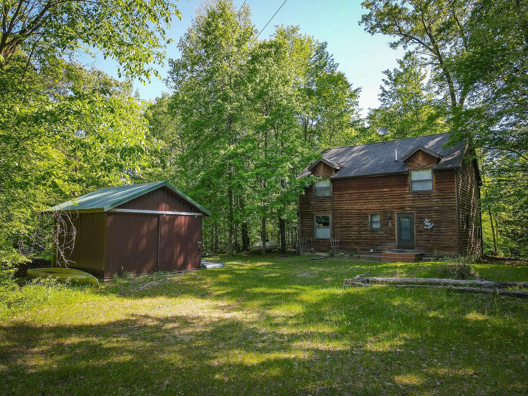 2.5 Acres of Land with Home for Sale in Walkerville, Michigan