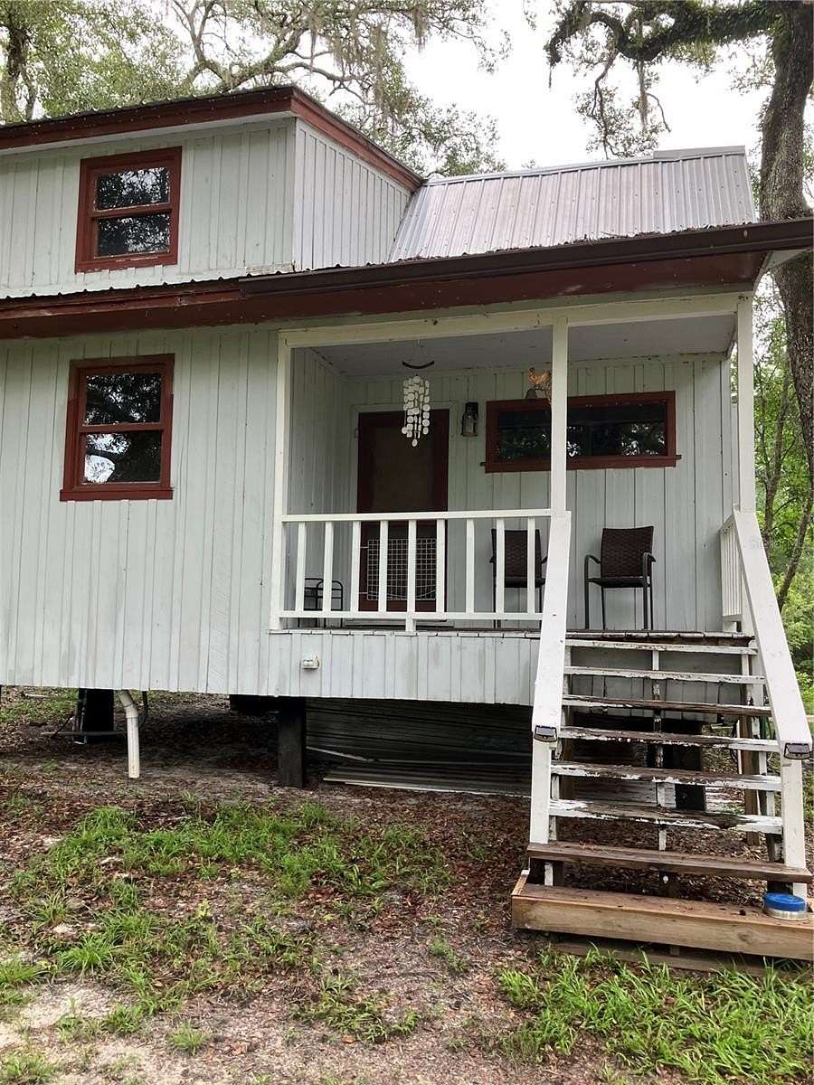 9.2 Acres of Land with Home for Sale in Dade City, Florida